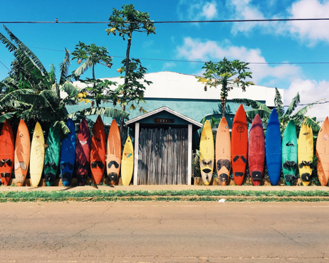 All-inclusive resorts include activities like surfing.